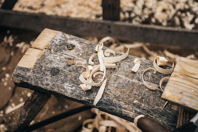 Wood shavings on a piece of craft wood